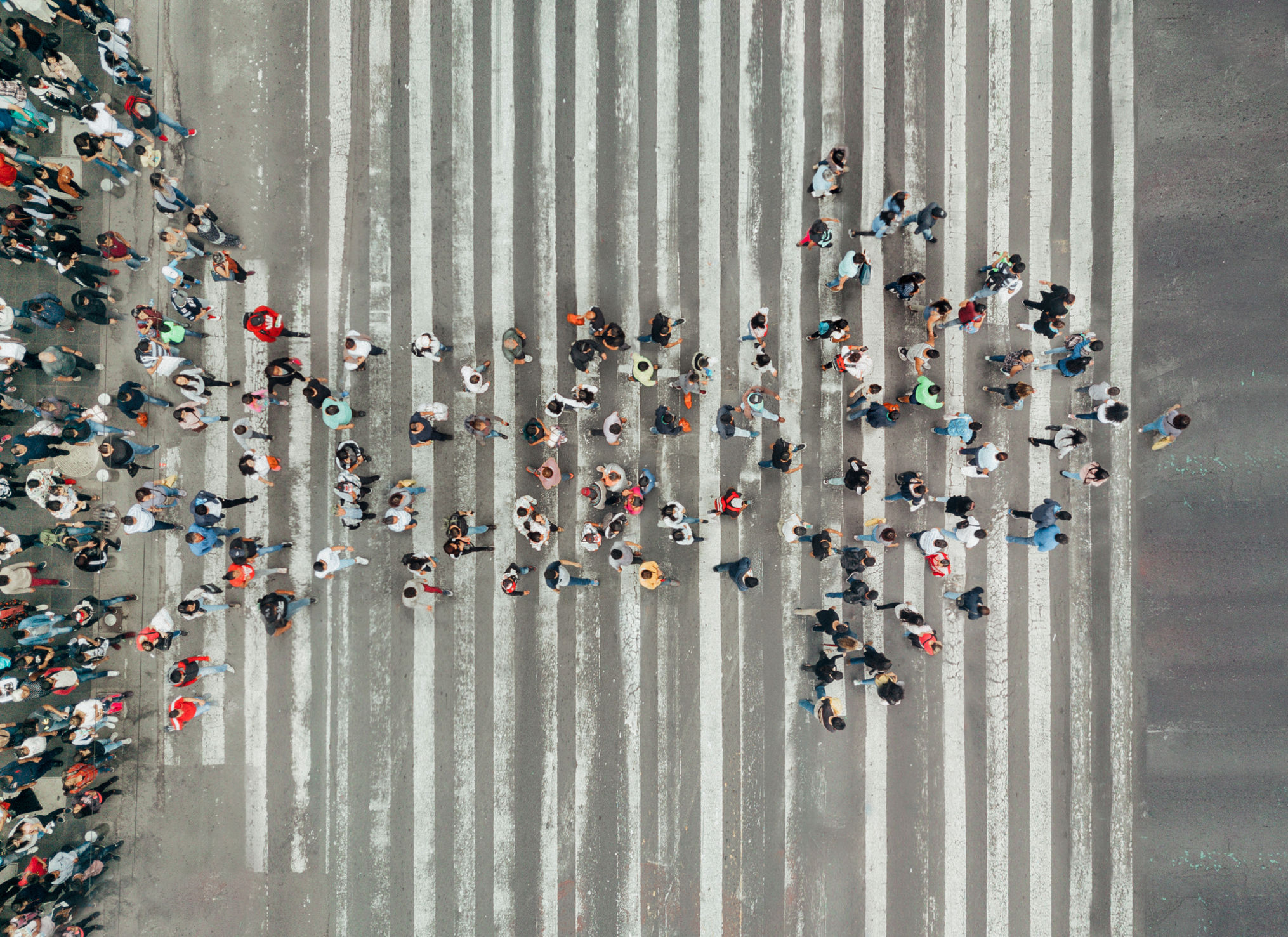 High Angle View Of People forming and arrow on the street